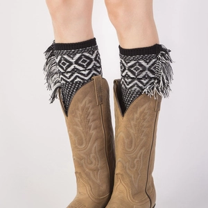 Bohemian knit leg warmers with diamond pattern and fringe paired with retro brown boots