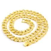 Detail of gold-plated iced-out Cuban link chain with sparkling leaf motifs and secure clasp