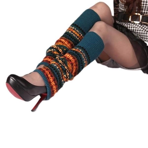 Close-up of Bohemian knit leg warmers in dark green with vintage orange jacquard pattern