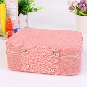 Pink crocodile texture makeup case with silver rivets and zipper closure for women