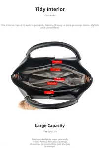 Top view of the black leather bucket bag showing multiple internal compartments and lining