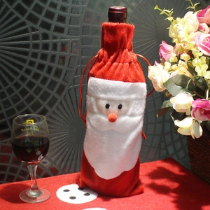 Santa Claus themed wine bottle cover made of red velvet and white faux fur decor