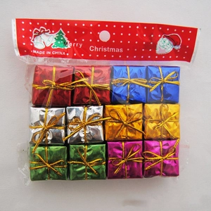 Detailed view of 12 mini colorful Christmas gift box ornaments with metallic finish
