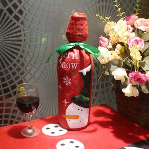 Christmas snowman wine bottle cover with red sequins and Let it Snow embroidery