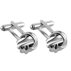 Detailed macro view of silver twisted knot cufflinks with polished stainless steel finish