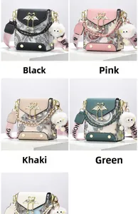 Detail of colorful crossbody bags with heart buckles, pearl chains and plush charms