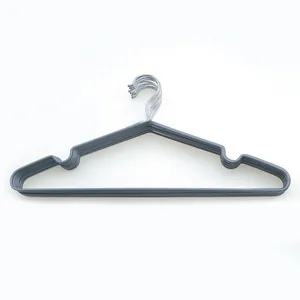 Close-up of gray non-slip clothes hangers with wide shoulder design and metal hooks