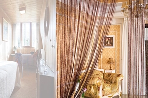 Detail of coffee brown Korean style string curtain with sparkling silver silk accents