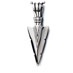 Close-up of vintage silver arrow pendant with detailed engravings and relief patterns