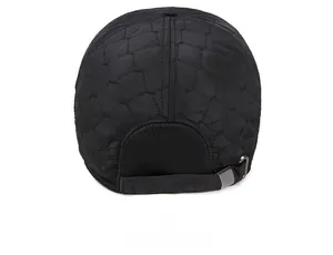Detail of the rear view of the quilted baseball cap with adjustable strap and metal buckle