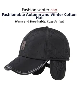 Detail view of black quilted winter baseball cap with thick ear flaps and warm lining