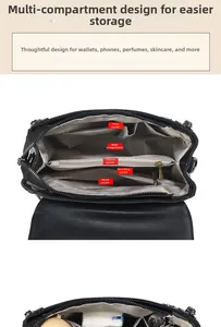 Detail view showing multi-compartment interior layout with zipper pockets and grey lining