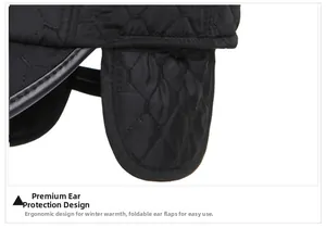 Detail of winter baseball cap showing diamond quilted fabric and foldable ear flaps