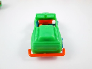 Rear view of mini plastic toy jeep in green and orange, perfect for gift gashapon prizes