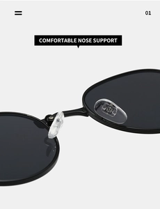 Detail der verstellbaren Silikon-Nasenpads an der schwarzen ovalen Sonnenbrille