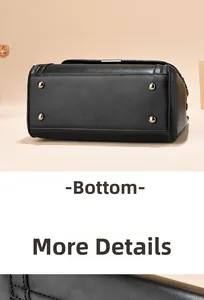 Detail view of black leather handbag base with four silver metal protective feet and stitching