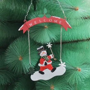 Christmas snowman hanging welcome sign made of red painted metal for holiday decor