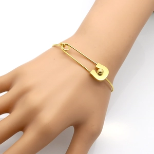 Elegant gold safety pin bracelet for women, minimalist titanium steel bangle worn on wrist