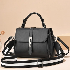 Minimalist black leather handbag with striped strap and silver hardware for women