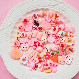Pink resin charms assortment featuring faux sweets and cute icons for DIY phone case crafts