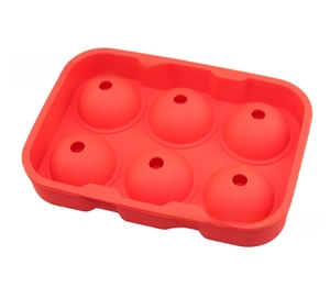 Detail of red food grade silicone ice mold base with six spherical cavities for large ice balls