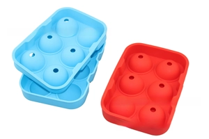 Detail of blue and red 6-hole spherical silicone ice cube molds with separate lids