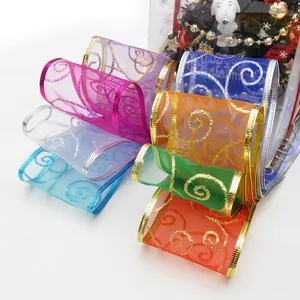 Glittering sheer organza Christmas ribbon rolls with gold swirls in seven assorted colors