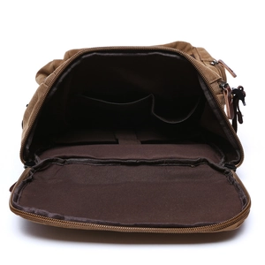 Large capacity canvas backpack with organized internal compartments for laptops and travel