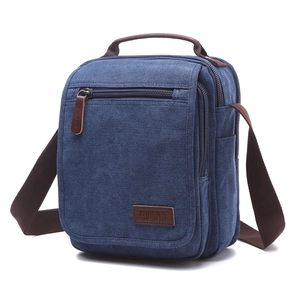 Men's casual canvas crossbody bag in dark blue with multi-pocket retro design