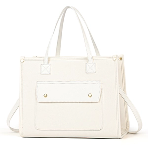 Detail of off-white lychee grain leather tote bag with front pocket and gold buttons