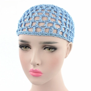 Close-up of light blue crochet hair net showing detailed mesh pattern on model