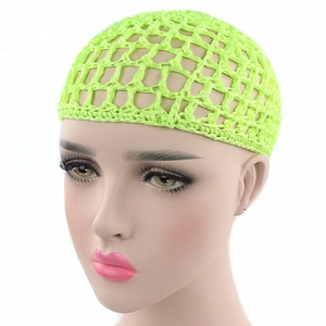 Detail of neon green handmade crochet hair net featuring a flexible open mesh structure