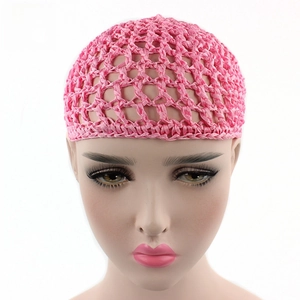 Detailed view of pink handmade crochet hair net cap with hollow diamond mesh structure