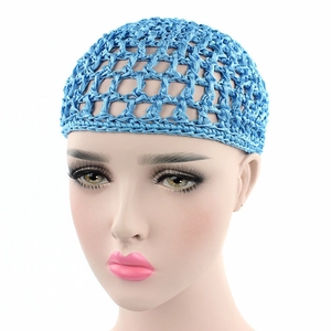 Detail showing blue crochet hair net cap with breathable mesh and reinforced edges