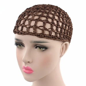 Detail of brown handmade crochet hair snood with large mesh on a mannequin head