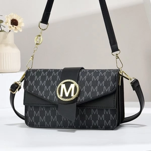 Sac bandoulière minimaliste en jacquard à motif M avec fermoir métallique doré
