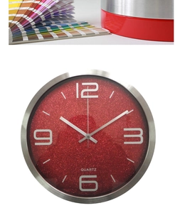 Close-up of a 12-inch stainless steel wall clock featuring a red glitter texture dial