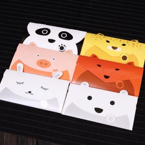 Close-up of 6 colorful animal themed gift envelopes with gold foil details and cute designs