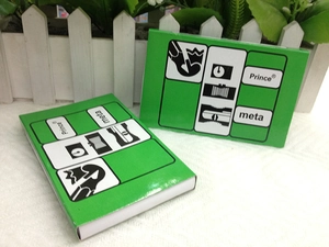 Close-up of Prince Meta green packaging boxes for lighter accessories on a white fence