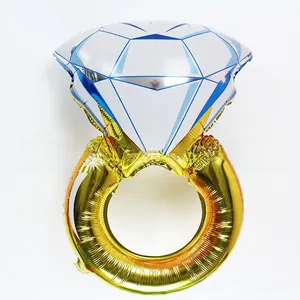 Detail showing high-shine gold ring balloon with faceted silver diamond foil topper