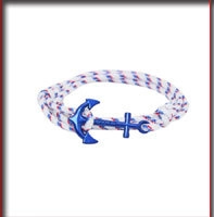 Macro detail of nautical woven rope bracelet with blue anchor charm for unisex