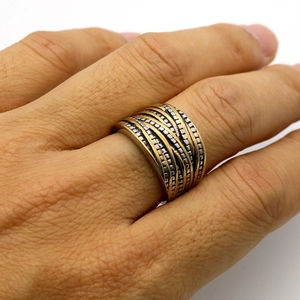 Vintage stainless steel two-tone industrial ring with textured square pattern surface