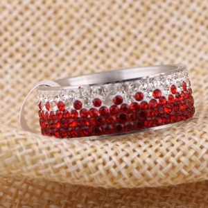 8mm stainless steel ring with gradient red and white rhinestones on burlap background