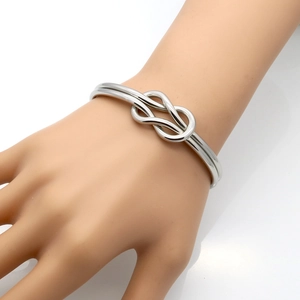 Elegant silver stainless steel knot bracelet for women with minimalist bow design