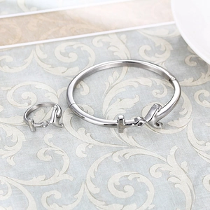 Polished stainless steel cuff bracelet and ring set with minimalist geometric design