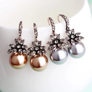 Vintage luxury flower earrings with matte crystals and large pearls in gold and silver