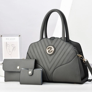 Three-piece dark grey pebbled leather handbag set with V-shaped stitching and gold buckle