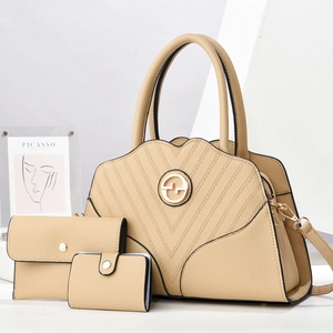Three-piece beige lychee grain PU leather handbag set with wavy stitching and metal logo