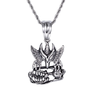 Silver eagle skull pendant in stainless steel with a twisted chain on white background