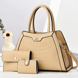 Three-piece beige croc-effect handbag set including a large tote and two smaller pouches